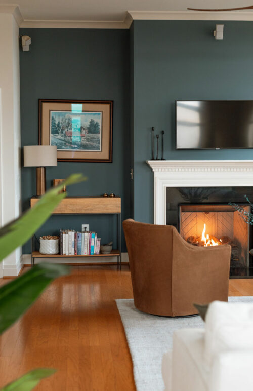 Modern living room with roaring fireplace